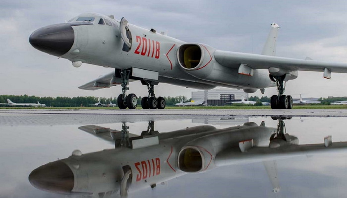 الصين | تدريبات جوية مشتركة ولأول مرة في التاريخ وهبوط الطائرة الروسية Tu-95MS في الصين وهبوط الصينية Xian H-6 في الاتحاد الروسي.